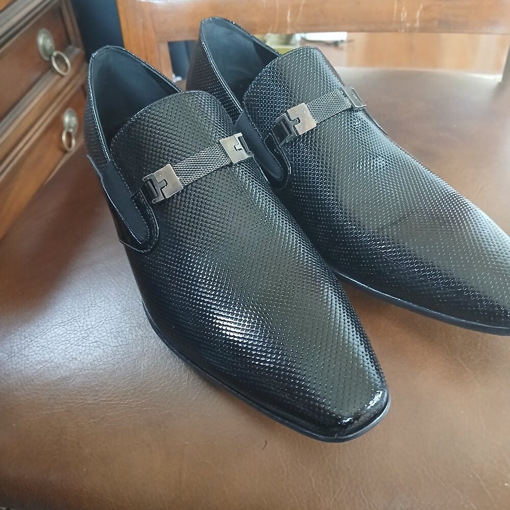 Sharp black embossed leather and patent leather formal mens shoes.